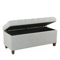 Banc de rangement capitonné à boutons avec couvercle à charnières et pieds en bois