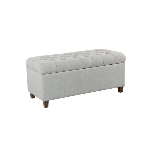 Banc de rangement capitonné à boutons avec couvercle à charnières et pieds en bois