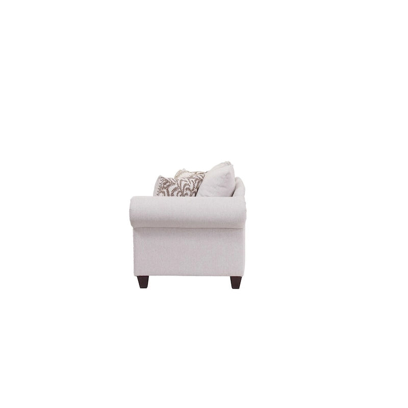 Divanetto classico in lino con bordino a borchie e cuscini reversibili